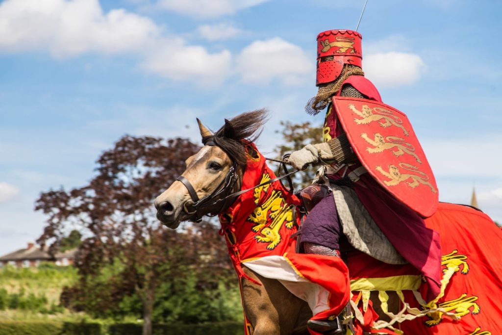 Re-enactor King Henry III on horseback